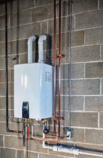 https://rossmoynehotwater.com.au/uploads/2025/06/instant-hot-water-systems-83505.jpg