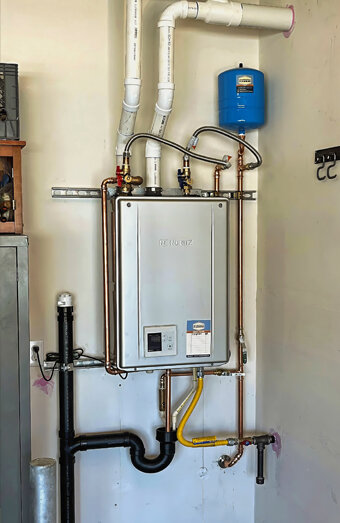 https://rossmoynehotwater.com.au/uploads/2025/06/instant-hot-water-systems-98444.jpg